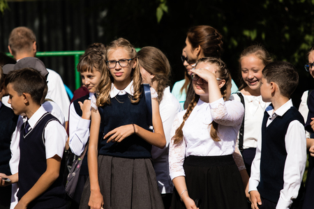 Petropavlovsk, Kazakhstan - September 2, 2017: School line is in schoolyard with pupils and...