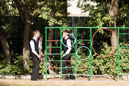 Petropavlovsk, Kazakhstan - September 2, 2017: School line is in schoolyard with pupils and...