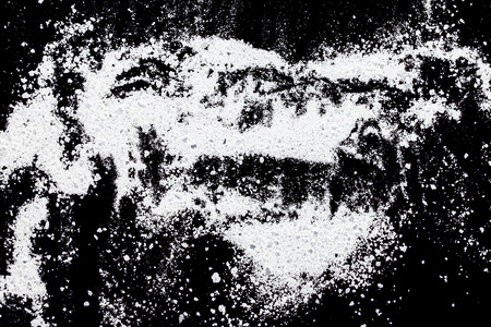 white powder on a black backgroundの写真素材