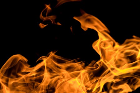 Fire flames on a black backgroundの写真素材