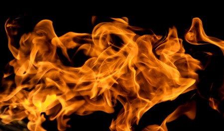 Fire flames on a black backgroundの写真素材
