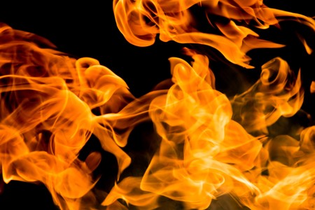 Fire flames on a black backgroundの写真素材