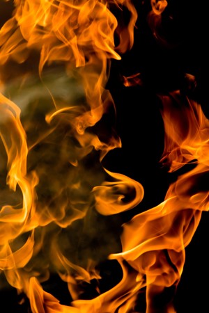 Fire flames on a black backgroundの写真素材