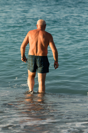 man on the beach, leisure landscapeの写真素材