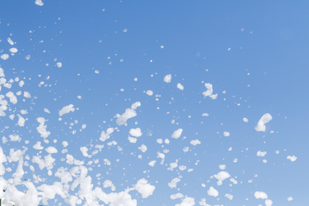 soap foam against the skyの写真素材