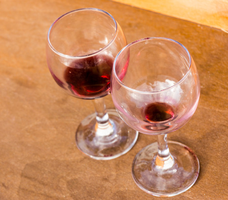 dirty glass of wineの写真素材