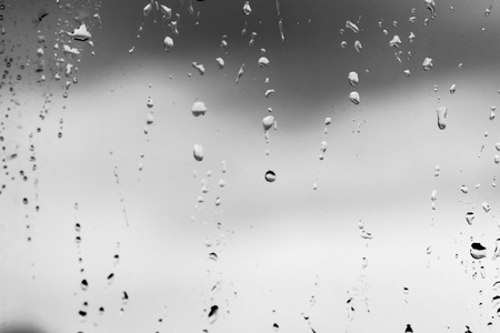 Rain drops on the glass, backgroundの写真素材