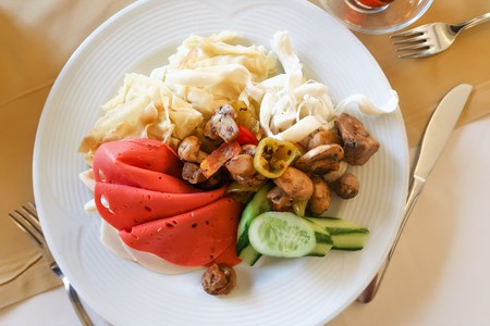 food in a plate, mushrooms pasta sausageの写真素材