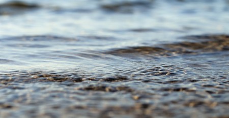 clear clear water in a lake with a waveの写真素材