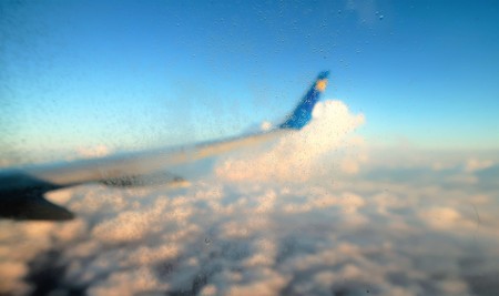 View from the airplane window, cloud wing, dimensionsの写真素材