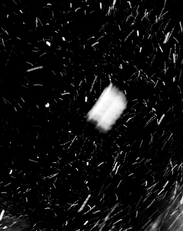 snow blizzard on a black backgroundの写真素材
