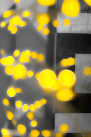 bokeh yellow lights garland backgroundの写真素材