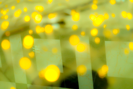 bokeh yellow lights garland backgroundの写真素材