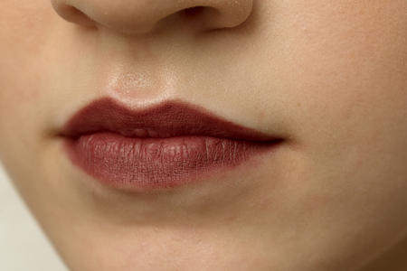 painted female lips closeupの写真素材