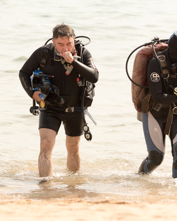 Sharm El Sheikh, Egypt - November 16, 2017: Divers go to the sea. Bay of Naama.のeditorial素材