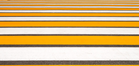 marking on asphalt, yellow whiteの写真素材