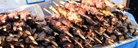 shish kebab on wooden sticks, fried meatの写真素材