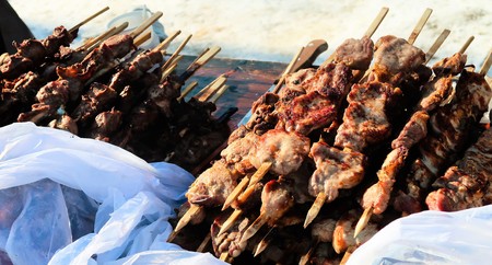 shish kebab on wooden sticks, fried meat