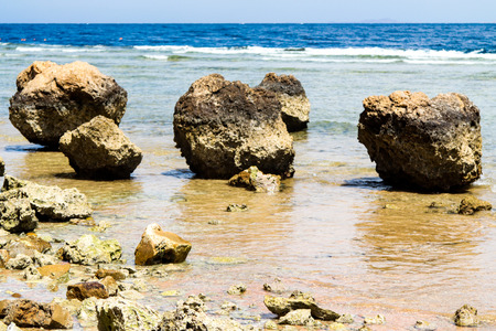 sea shore waves stones landscapeの写真素材