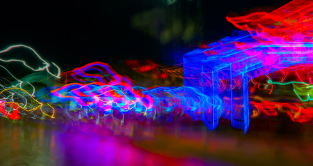 blurred lights in motion on a black background