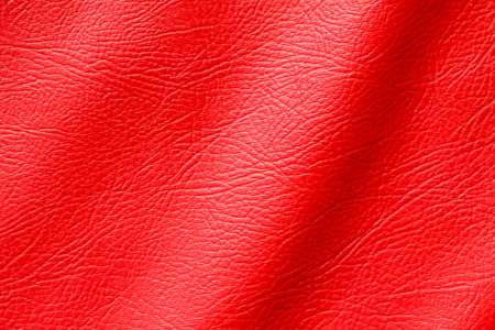 red background of leatheretteの写真素材