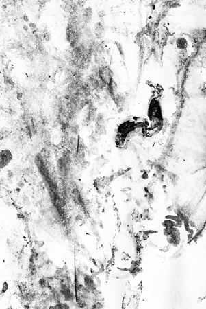 dirty black stains on white backgroundの写真素材