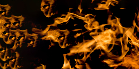 Fire flames on a black backgroundの写真素材