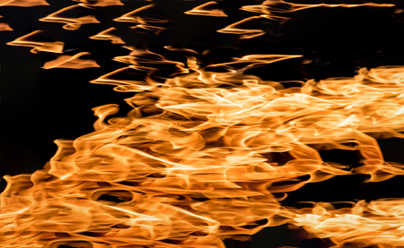 Fire flames on a black backgroundの写真素材