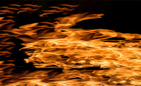 Fire flames on a black backgroundの写真素材