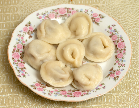 dumplings in a plate on a table, foodの写真素材