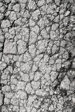 cracked asphalt old as backgroundの写真素材