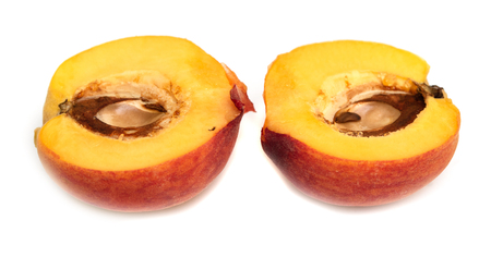 ripe peach on a white background isolatedの写真素材