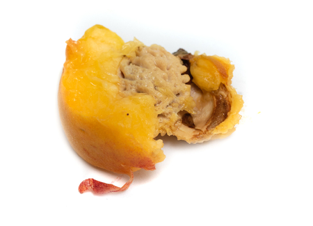 ripe peach on a white background isolatedの写真素材