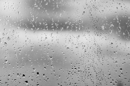 drops of rain on a windowpane, backgroundの写真素材