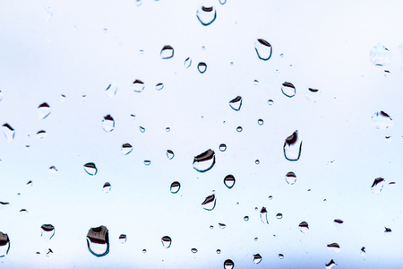 raindrops on the glass skyの写真素材