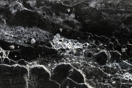 black soot on concrete wall backgroundの写真素材