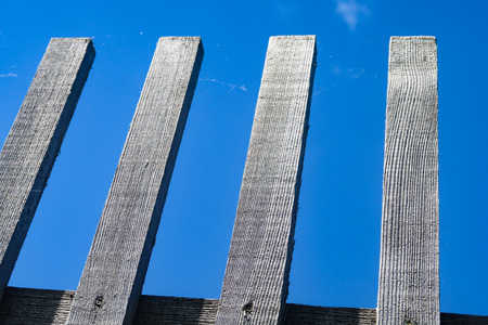 old wooden fence in the village nature sky