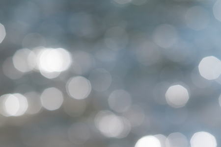 the sun shines on the waterの写真素材