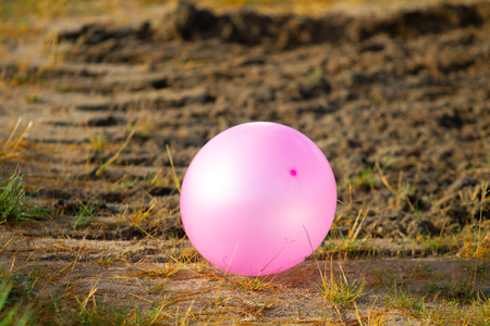 colored balloons on the groundの写真素材