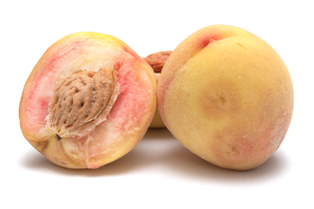 peaches isolated on white backgroundの写真素材