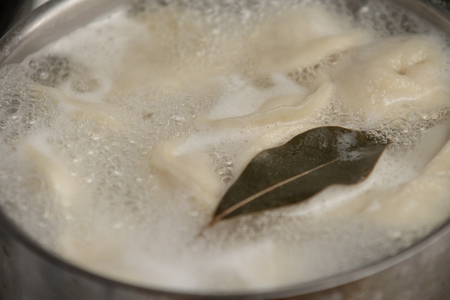 dumplings with broth in a plate, foodの写真素材