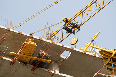 construction of a high-rise monolithic house craneの写真素材