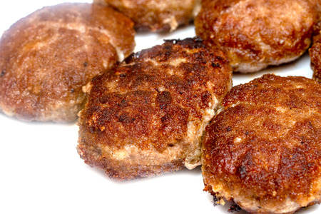 fried meatballs on a white backgroundの写真素材
