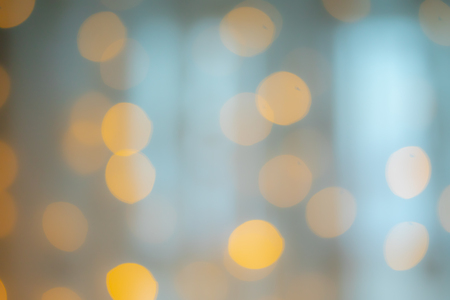 blurred yellow bokeh as backgroundの写真素材