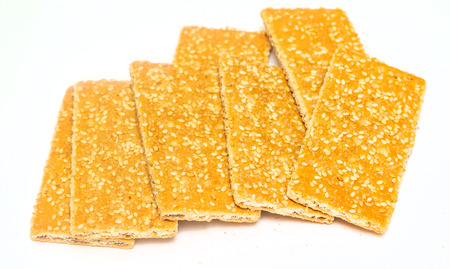 sesame crackers cookies on white backgroundの写真素材