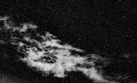 snow, stars, white dots bokeh on black background