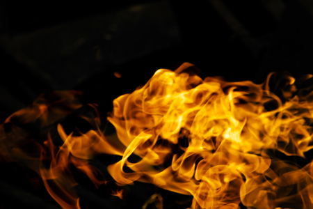 Fire flames on a black backgroundの写真素材