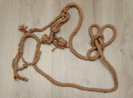 Ropes on a wooden backgroundの写真素材