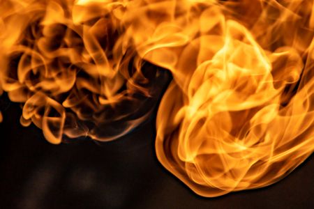 Fire flames on a black backgroundの写真素材
