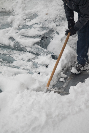 snow shoveling winterの写真素材